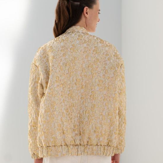 Bomber goud print