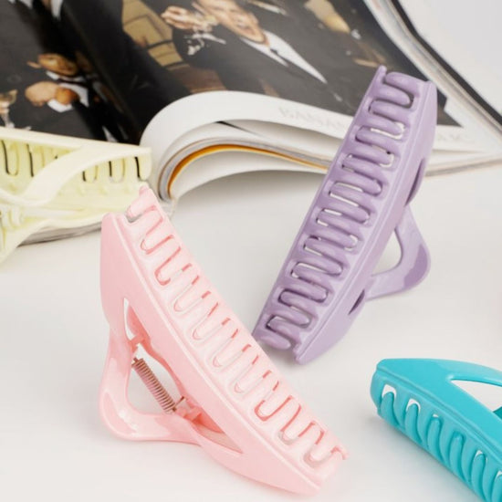 Haarklem triangel roze