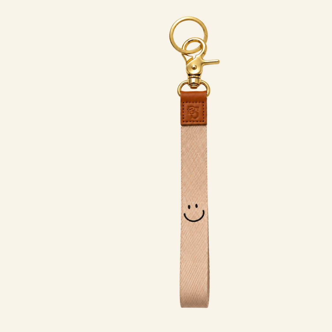 Keycord beige smiley - Liefs uit Zierikzee 