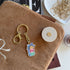 Sleutelhanger Macaron Emily in Paris - conceptstore Liefs uit Zierikzee